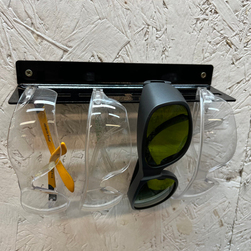 Wall mounted safety glasses rack in gloss black steel, 220mm wide
