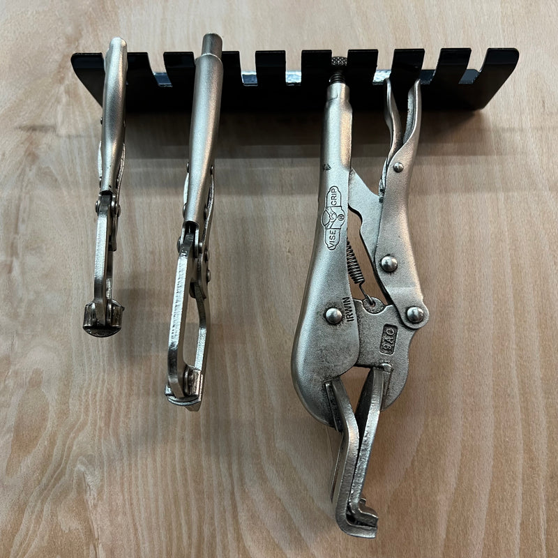 Wall mounted vice grip holder in gloss black steel, 220mm wide